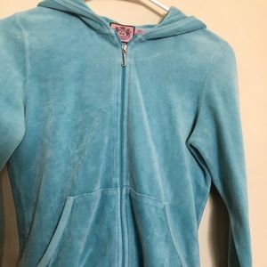 A vintage juicy couture zip up hoodie